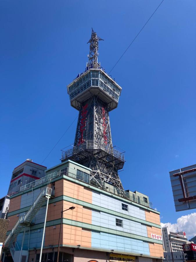 J-Hoppers Beppu Guesthouse ジェイホッパーズ別府ゲストハウス Ngoại thất bức ảnh